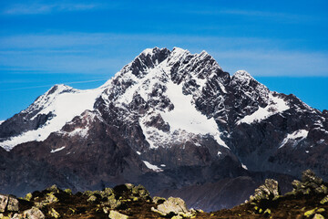 Obraz premium The south face of Mount Disgrazia, a well-known mountaineering destination in the Bregaglia Alpine Range