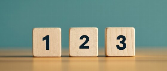 Simple wooden blocks displaying numbers one, two, and three against a soft blue background, perfect for educational visuals.