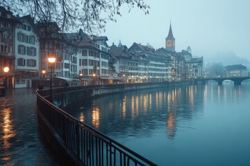 Fototapeta premium Cityscape of zurich reflecting on limmat river at twilight