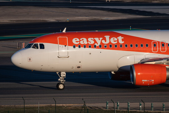 EasyJet airplane in a runway of Adolfo Suarez Madrid-Barajas Airport, on the 15th of December of 2024, in Madrid, Spain.