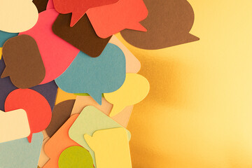 Colorful Speech Bubbles on Gold Background
