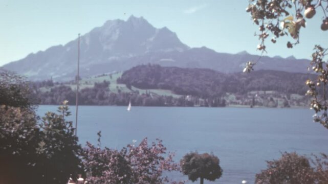 Massif of Mount Rigi surrounded by Lake Lucerne, Lake Zug, and Lake Lauerz. A unique alpine landscape captured in the 1950s. Color 4K archival footage.