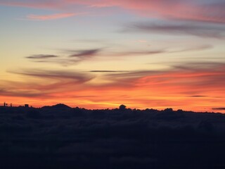 Abstract vibrant sky displaying an array of vivid colors during sunset, serene, nature