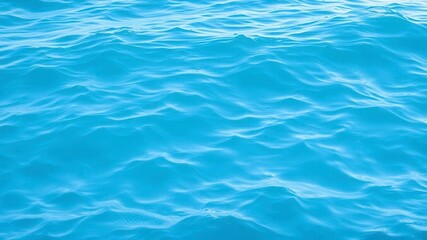 Obraz premium Blue water wave texture background with vibrant shades of blue, creating a calming and soothing pattern, vibrant, wave, ripple