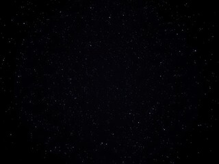 Fototapeta premium Night sky with twinkling stars against a black backdrop, dark, sparkling, serene