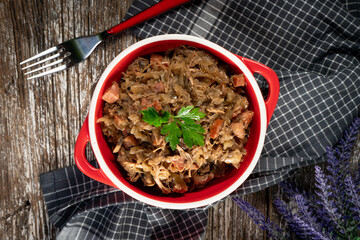 Bigos - sauerkraut stewed with meat, dried mushrooms and sausage.