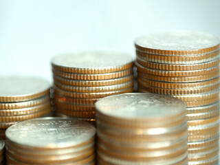 Stack of coins. In the concept of saving money and finance.