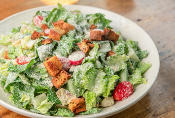 Caesar Salad with Tomato on a Plate