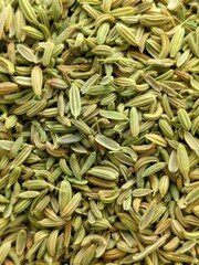 Fennel seeds or soaf background. Fennel seeds as use for mouth freshener in india. Fennel seeds are often chewed at the end of a meal in India to freshen the breath and aid digestion
