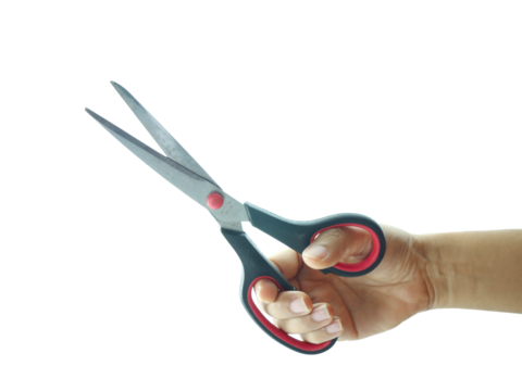 Female hand holding Scissors isolated on white background.