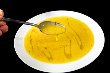 Strong food, mocoto Brazilian soup made from cow's feet, stewed with beans and vegetables. Traditional mocoto broth, it´s the foot of the cow cooked until it turns almost a gelatin.