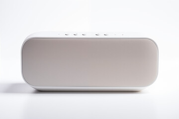 Modern, minimalist, and futuristic wireless speaker in a compact design, showcasing sleek aesthetics and advanced technology, displayed on a clean white background for a contemporary appeal