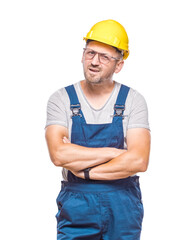 Doubtful and dissatisfied construction worker holding her arms crossed, isolated on white background. Angry and annoyed face, skeptical and suspicious expression. Craftsman against white wall