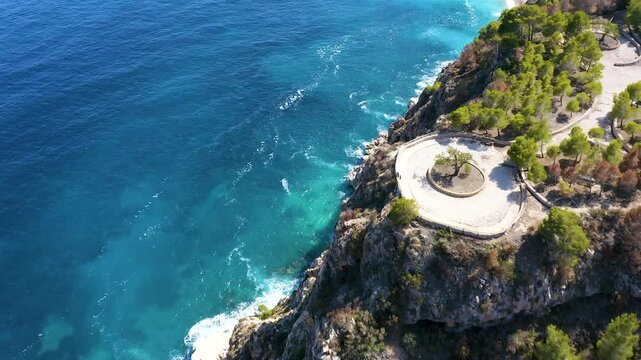 Aerial view of the wonderful Cala del Moraig and Cala de los Tiestos, located between the beautiful cliffs of the town of Benitachell, in the Mediterranean province of Alicante, Spain.