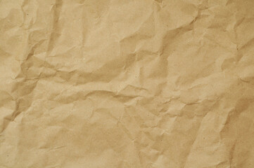 Creased old vintage paper background, antique crumpled paper background, concept of recycled materials