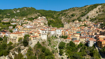 Obraz premium Aerial view of Castelmezzano, in the province of Potenza, Basilicata, Italy. It is a town built on a mountain in the Dolomiti Lucane park.