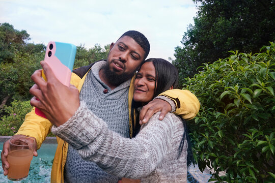 Friends taking selfie outdoors