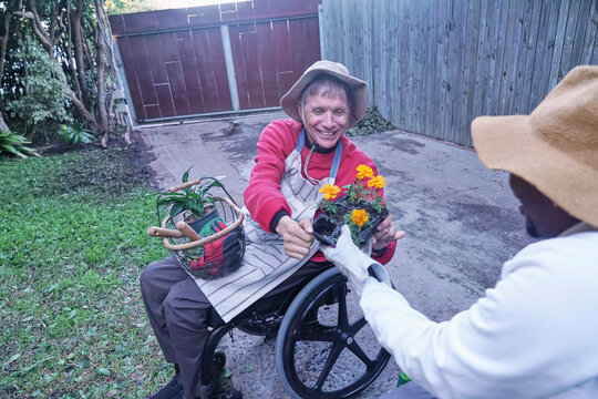 Disabled men gardening