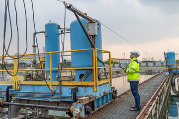 Environmental engineers work at wastewater treatment plants,Water supply engineering working at...