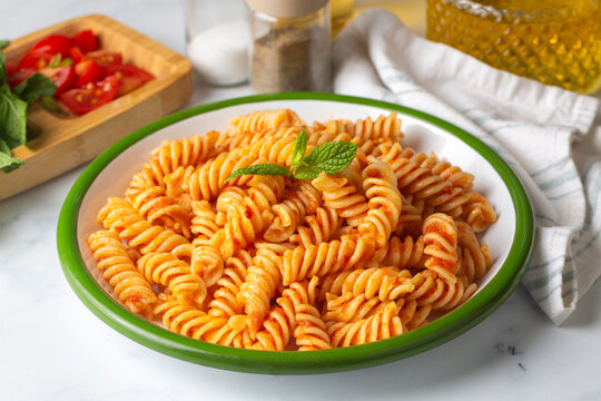 Fusilli pasta, spiral or spirali pasta with tomato sauce - Italian food style