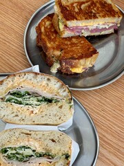 sandwiches on metal plates