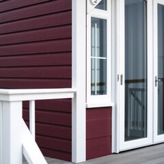 Fototapeta premium A tight close-up photograph of a beach house, rich burgundy and deep blue colors creating a sophisticated and elegant aesthetic, emphasizing fine details