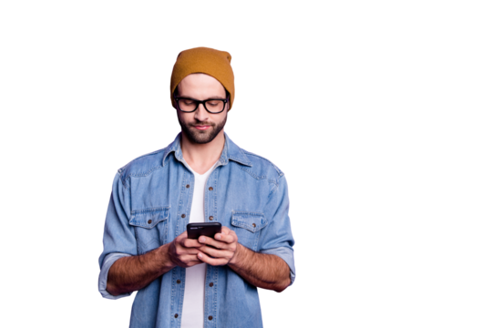 Cool handsome guy holding telephone writing friends casual denim outfit isolated violet background