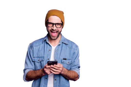 Cool handsome guy holding telephone reading unbelievable good news casual denim outfit isolated violet background
