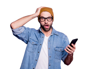 Photo of cool guy holding telephone reading bad news wearing specs casual denim outfit isolated violet background