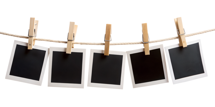 blank photo frames on rope isolated on white background 
Png