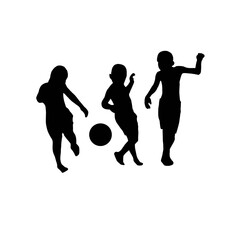 silhouette of kids playing football 