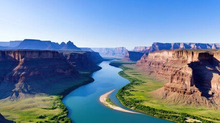 Fototapeta premium Scenic view of a river winding through majestic canyon landscapes.