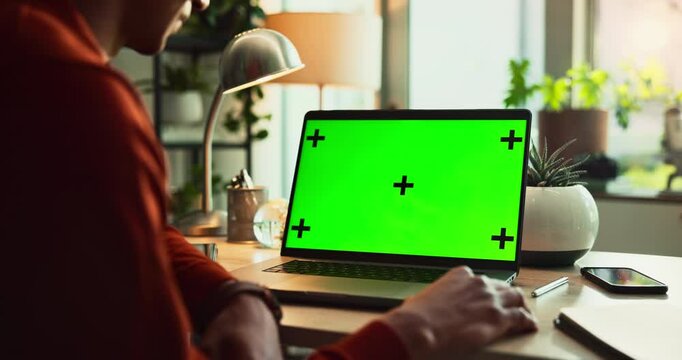 Laptop, hands and green screen for mockup, tracking markers and branding as digital ux. Person, technology and connect with ui, network and internet for online, website and advertising in home office