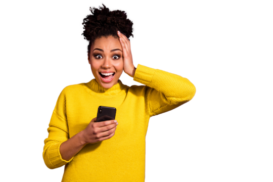 Portrait of her she nice attractive lovely cheerful cheery ecstatic amazed astonished wavy-haired girl holding in hands device great news isolated over bright vivid shine violet background