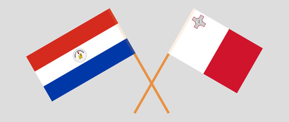 Crossed flags of Republic of Paraguay and Malta. Official colors. Correct proportion. Vector illustration
