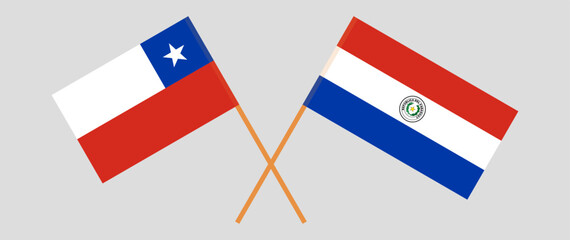 Crossed flags of Chile and Republic of Paraguay. Official colors. Correct proportion. Vector illustration