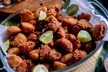 fried fish fillet and lemon slices
