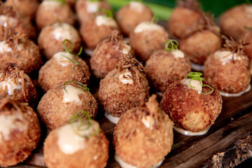 rustic cuisine, fish cakes on a wooden board