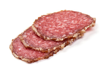 Dried Sliced Salami Sausage, isolated on white background. Close-up.