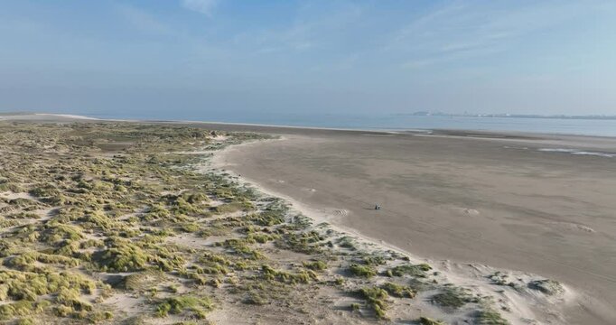 Drone footage of the Dunes of Texel National Park on a sunny day in De Koog, Texel, Netherlands