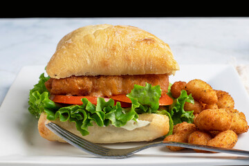 fish fillet sandwich,  with shrimp poppers
