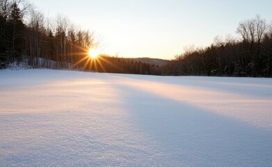 Naklejka premium The winter mountain scenery is enhanced by a glorious sunrise.