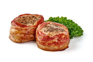 Bacon-wrapped pork medallions, isolated on white background.