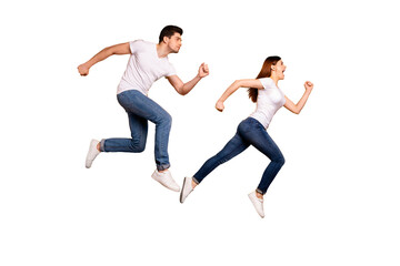 Full length side profile body size photo funky funny she her he him his guy lady jump high hurry shopping black friday low prices wear casual jeans denim white t-shirts isolated yellow background