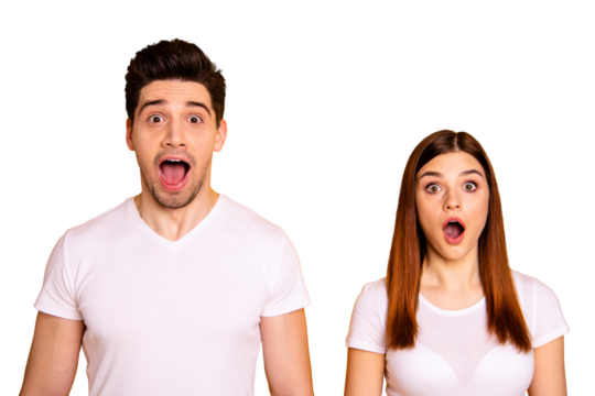 Close up photo two cool amazing beautiful she her he him his couple standing side by side open mouth eyes unbelievable success wear casual white t-shirts outfit clothes isolated yellow background