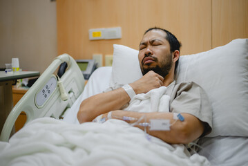 A male influenza patient is stressed about his symptoms.