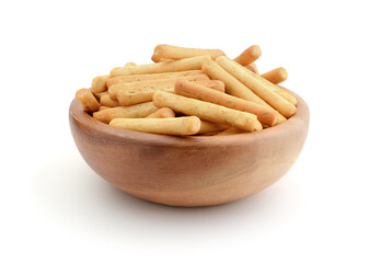 Breadsticks in a wooden bowl isolated on white.