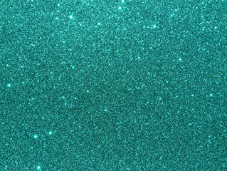 Blue sparkle background. Turquoise glitter background. Turquoise glimmer. Abstract twinkle texture....