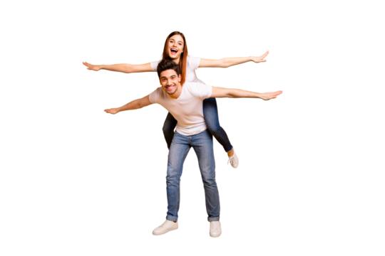 Full length body size view portrait of his he her she two nice attractive cheerful cheery optimistic people having fun trip fly isolated over vivid shine bright yellow background