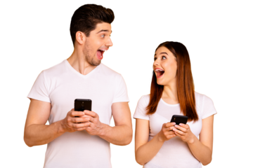 Portrait of his he her she two nice attractive lovely stylish trendy cheerful cheery positive people using new cool gadget device wow isolated over vivid shine bright yellow background
